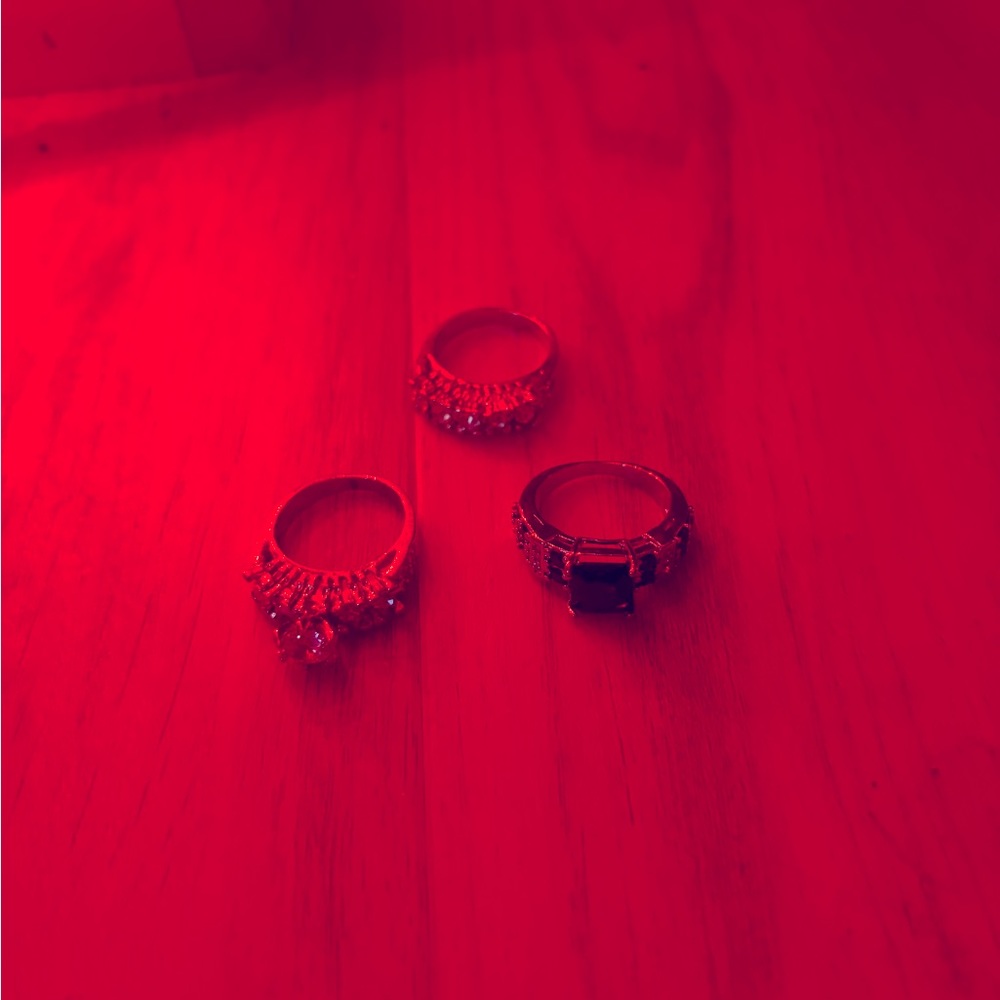 Three designer rings, never worn